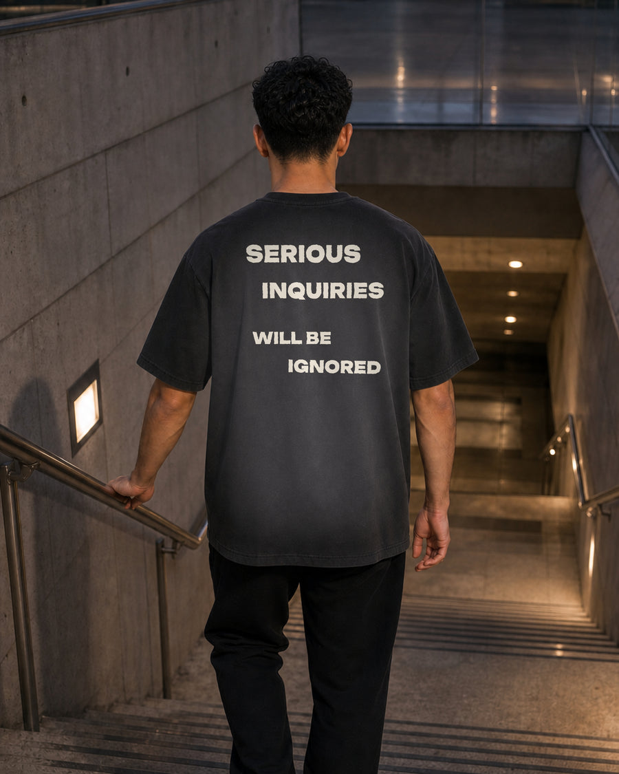 Serious Inquiries Tee rear model view in Shadow