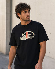 Model wearing the Utopia Pending Tee in Black, front view