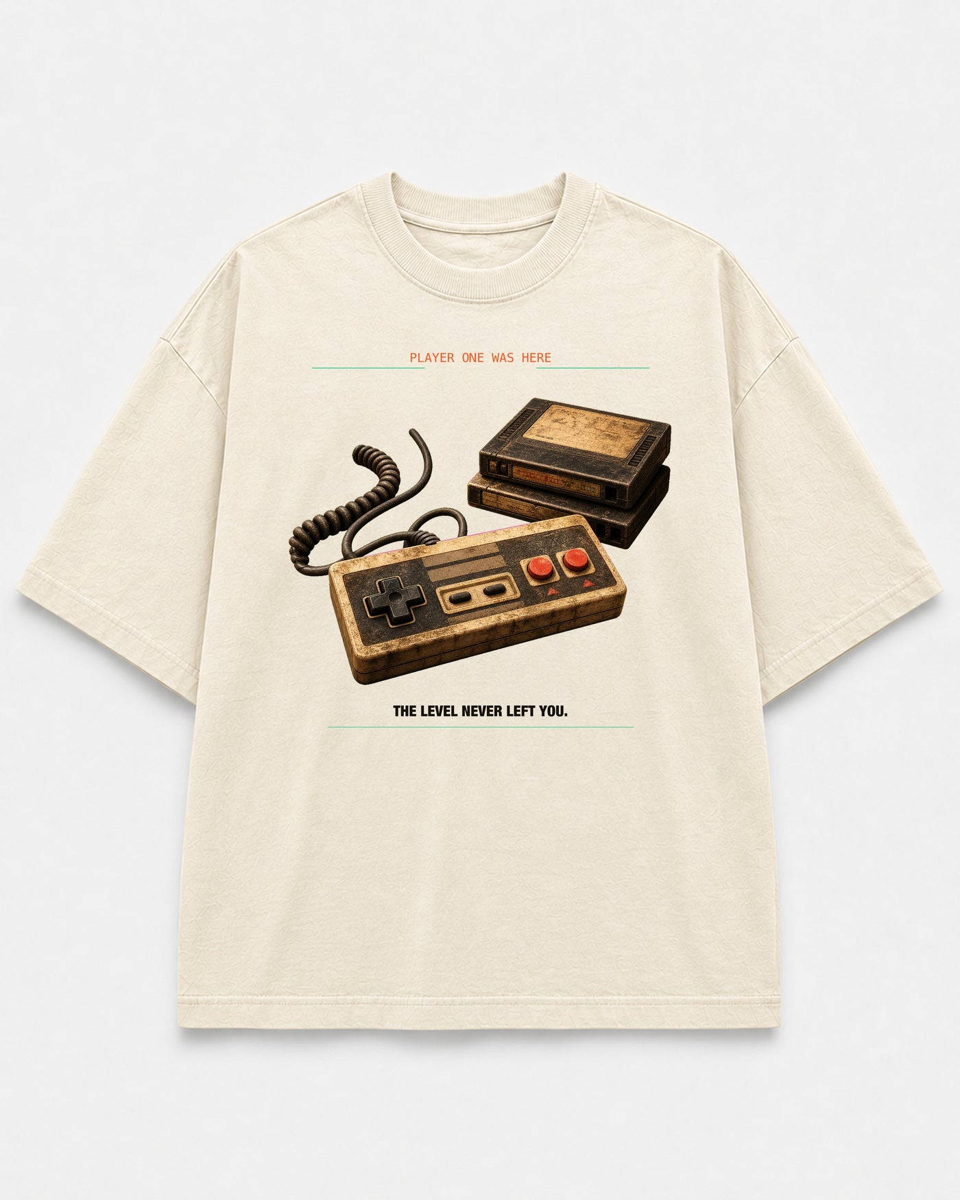 Save File Found Tee cream front mockup with worn retro game controller and cartridge artwork