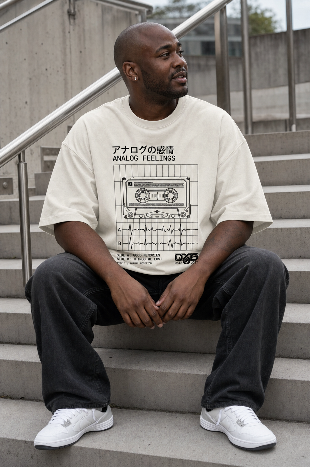 Analog Feelings Tee model wearing the Cream graphic tee