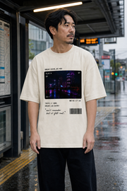 Dream Cache Tee model wearing the Cream graphic tee