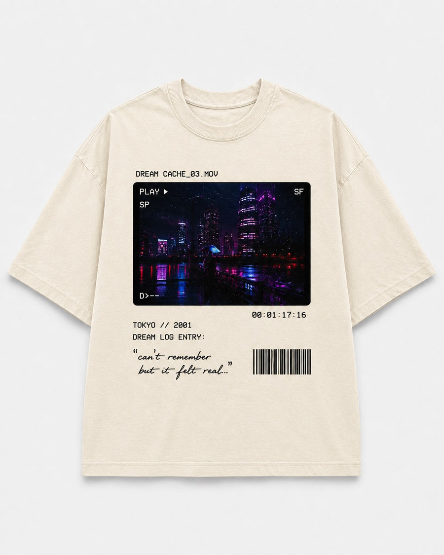 Dream Cache Tee front graphic with timestamp dream-file and neon city details