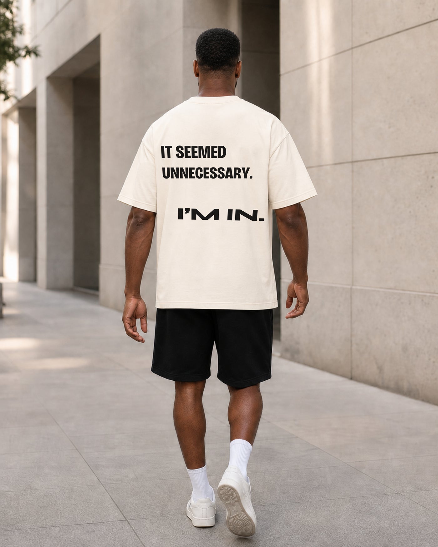 It Seemed Unnecessary Tee rear model view in Cream
