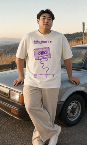 Rewind The Future Tee model wearing the Cream graphic tee