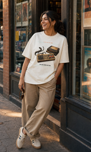 Save File Found Tee model wearing the Cream graphic tee