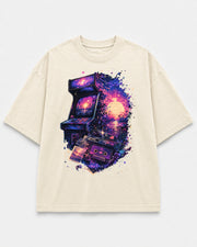 Soft Reset Club Tee cream front mockup with arcade cassette sunset artwork