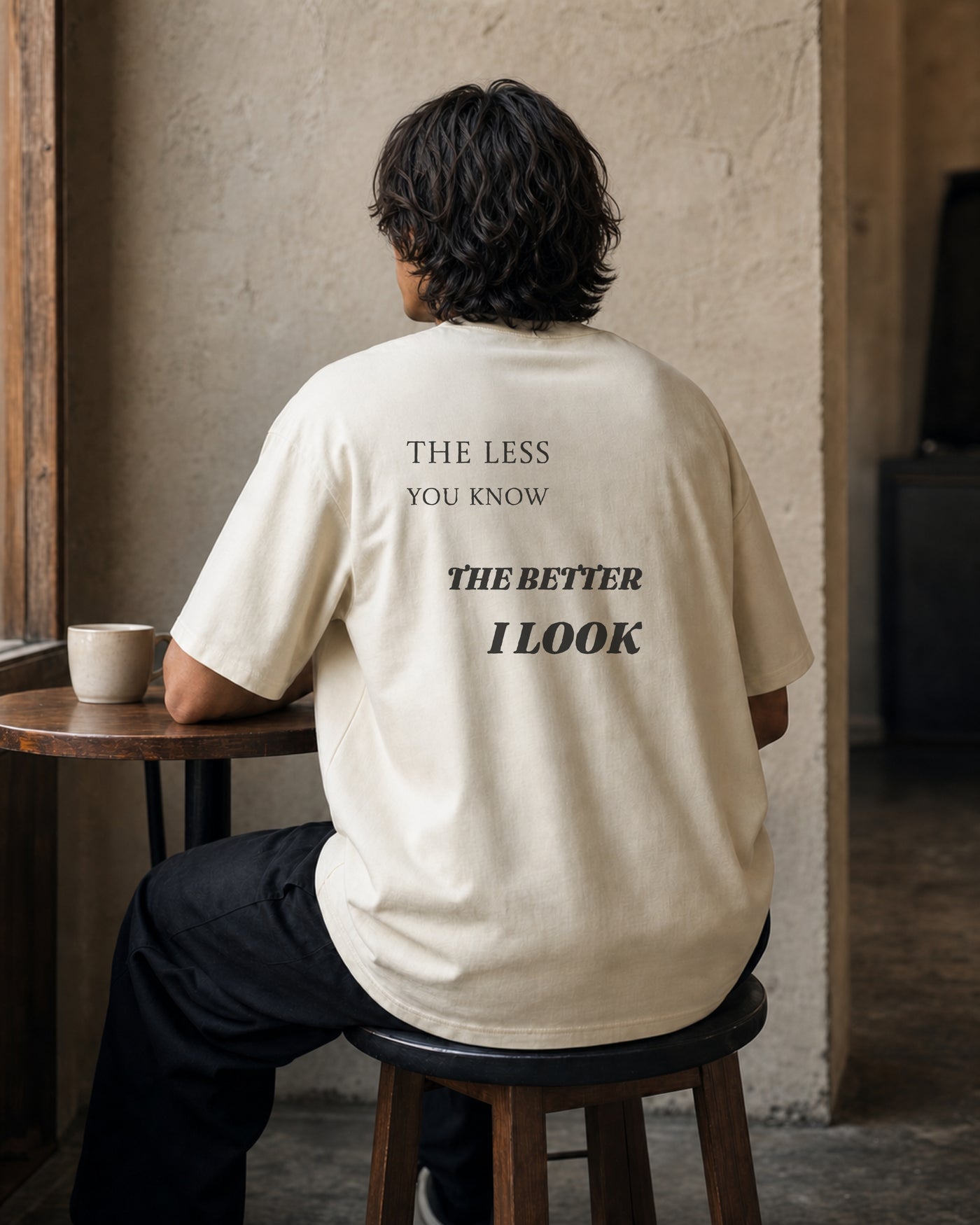 The Less You Know Tee rear model view in Cream