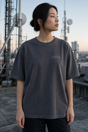 The Signal Tee model wearing the Shadow graphic tee